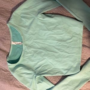 Lululemon Wunder Train Cropped
Long Sleeve Shirt- Size 2